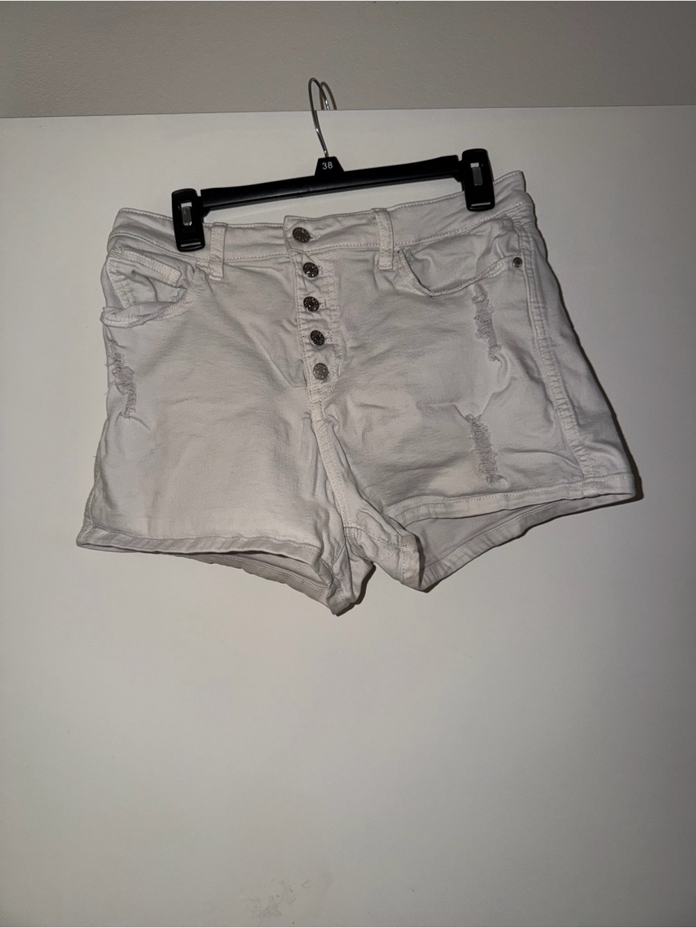 Guess women’s White Button-Front Distressed Denim Shorts